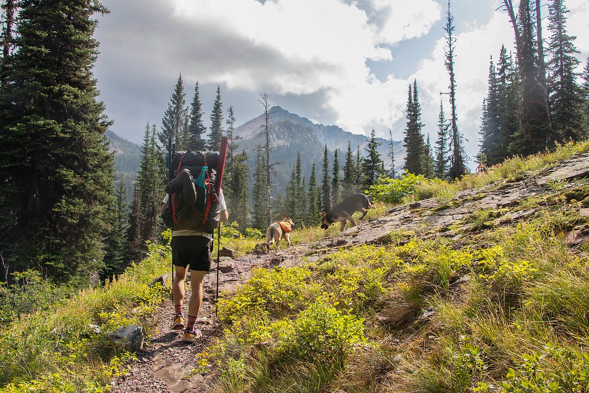 Brandon Phillips, owner of Glacier Hikes and Bikes, on an overnight pack raft trip around Holland Lake. (Kate Heston/Daily Inter Lake)