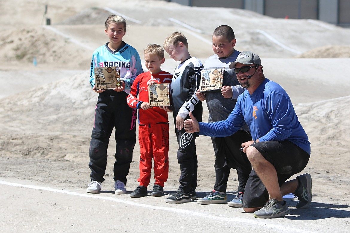 The top fundraisers from Moses Lake BMX smile for a photo at Sunday’s race.