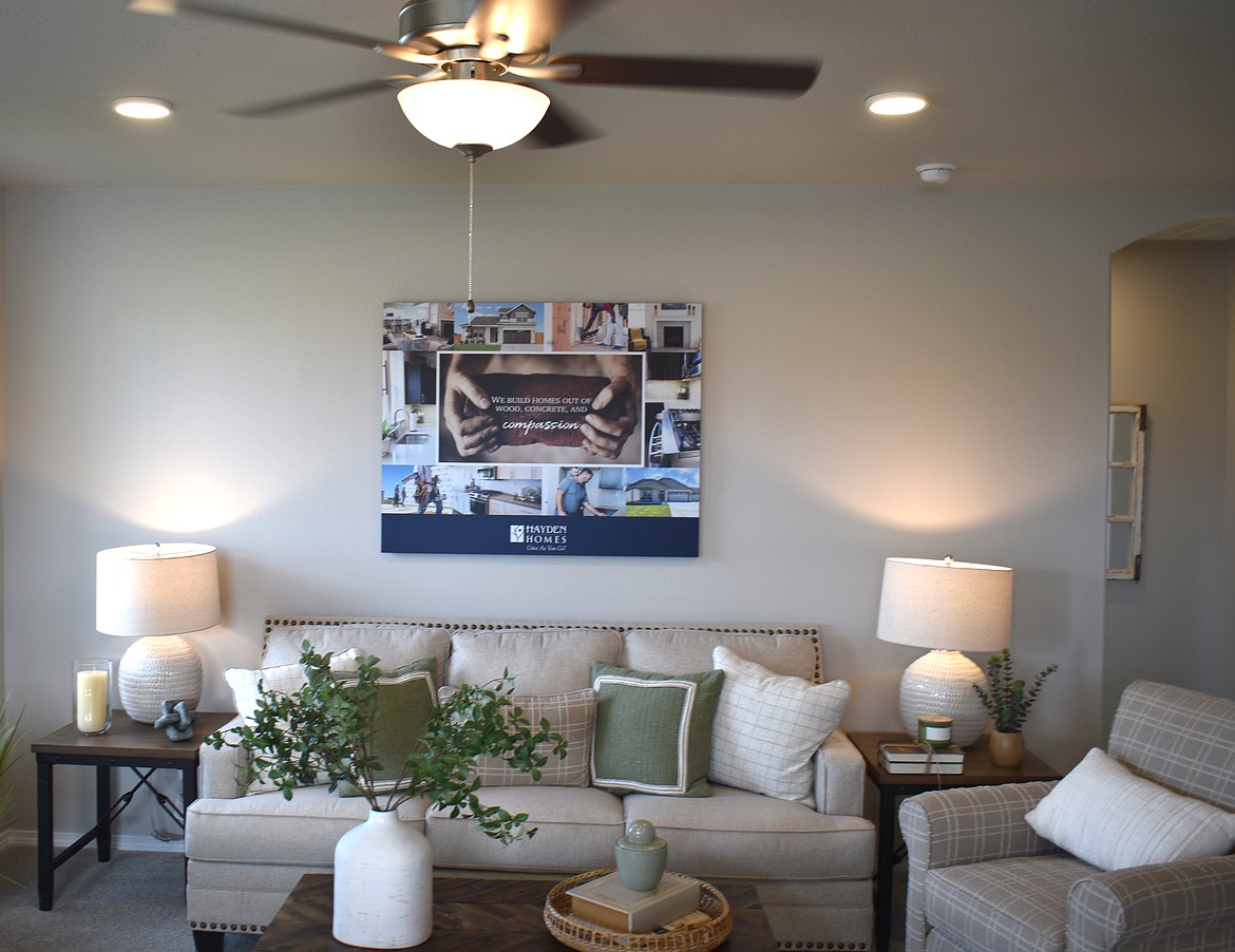 The living room of the model home at Polo Ridge. Hayden Homes staff furnished and decorated it to give potential buyers a feel for what it would be like to live in a home like it.