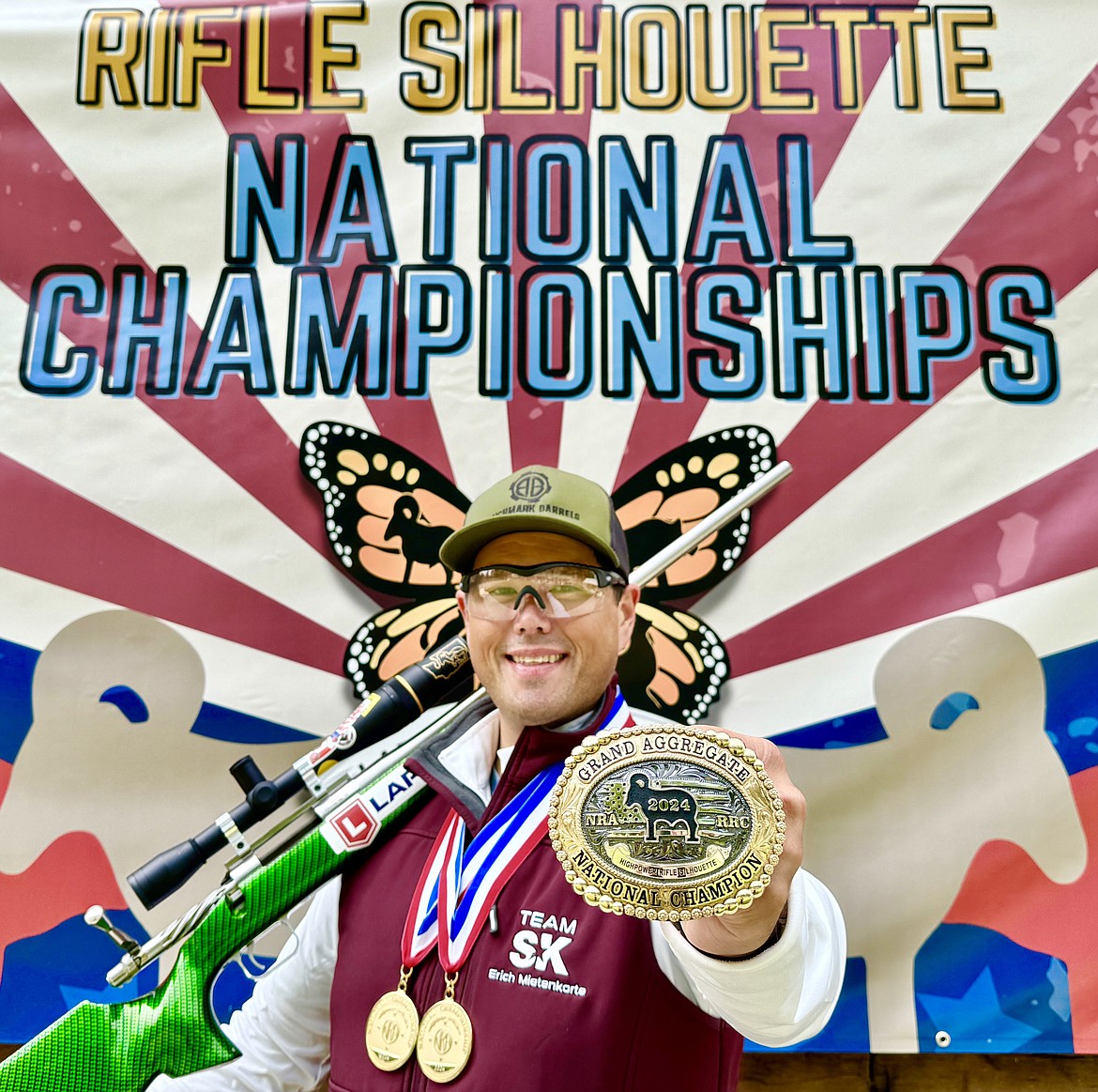 Erich Mietenkorte holds up his trophy after winning the U.S. High-Power Silhouette National Championship in Ridgway, Pennsylvania earlier this month.