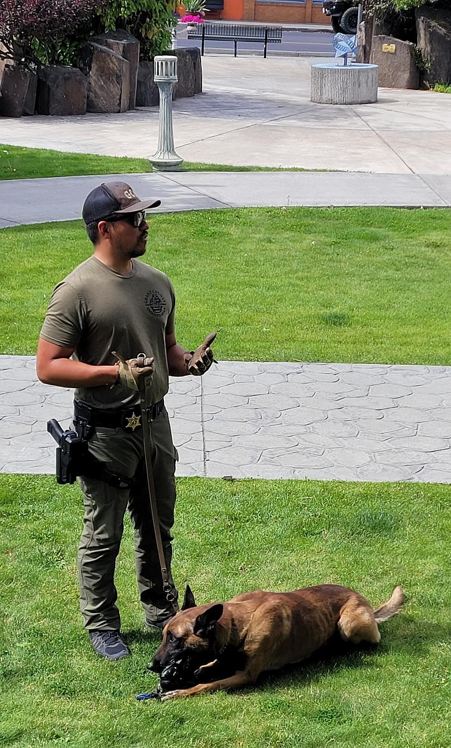 Grant County Sheriffs Office Deputy Luis Jimenez with his K-9 partner, Uno, at Rock Park in Ephrata Wednesday afternoon.