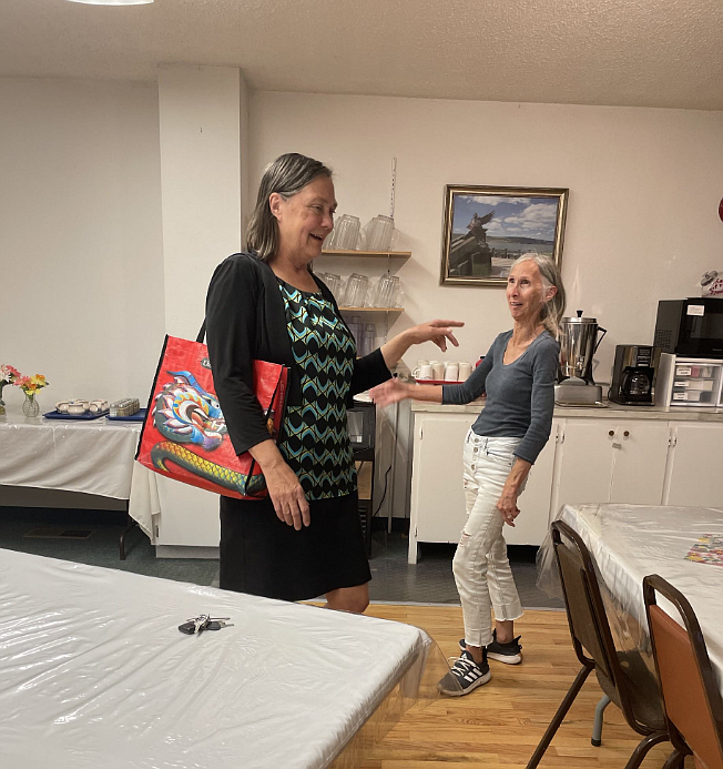 Leslie Taylor, former Soap Lake City Council member says goodbye to Karen Woodhouse, a Soap Lake City Council member on Tuesday. Taylor resigned from the council in closing comments of the meeting.