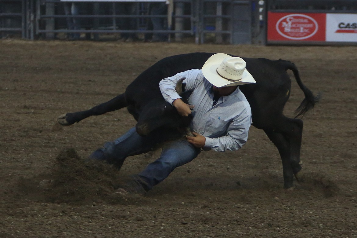 Antelope, Oregon native Cord Gomes takes down a steer at the Moses Lake Roundup on August 15.