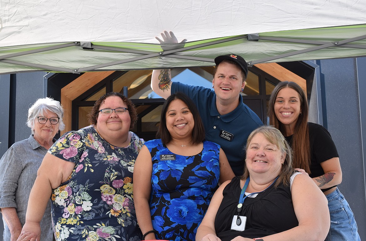 It takes a village: From left, Nancy Wood, Stephanie Gonzales, Mary Anderson, Casey Brandel, Meri McSwain and Holly Aragon have been working for months to make the back-to-school supply event at the Children's Village in Couer d'Alene possible.