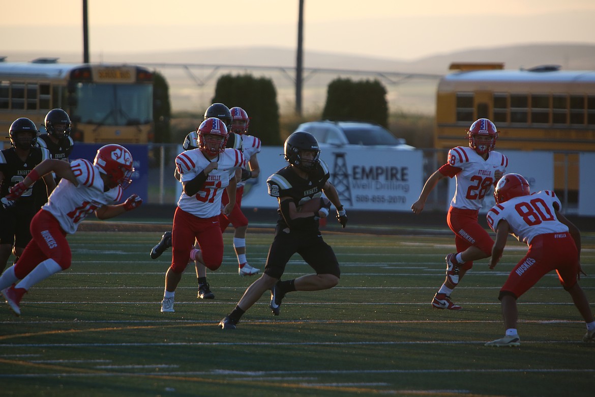 Royal running back Ethan Ellis (22) returns a kickoff against Othello last September. The Knights won their fourth consecutive state championship last December, while Othello aims to defend its co-Central Washington Athletic Conference title, shared with Ephrata a year ago.