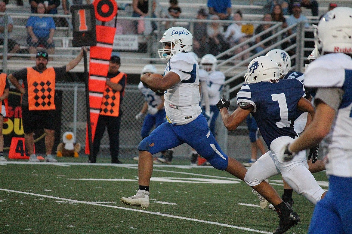 Soap Lake quarterback Jairo Lopez carries the ball during a league game against MLCA/CCS last fall. Soap Lake finished the 2023 season with a 5-5 mark, while the Lions went 7-2 in their inaugural season on the gridiron.