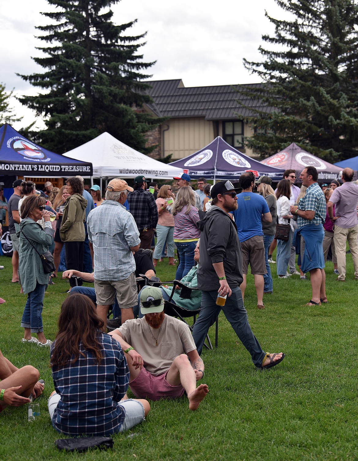 A beer-loving crowd could choose from 15 brewery booths at the Brewfest Saturday in Depot Park. (Julie Engler/Whitefish Pilot)