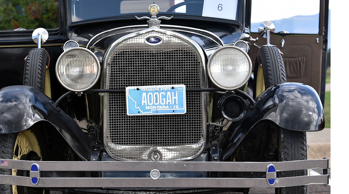 A classic Ford sports a clever license plate at The Springs' car show. (Julie Engler/Whitefish Pilot)