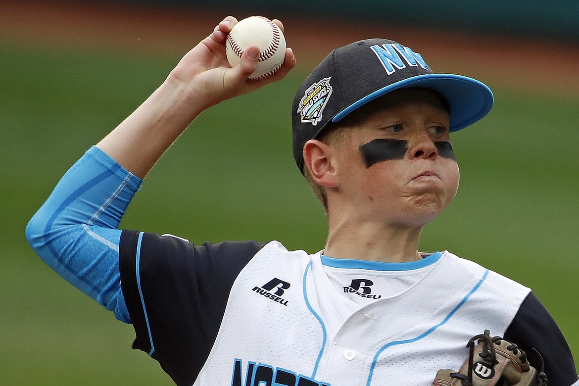 GENE J. PUSKAR/Associated Press
Chris Reynolds of Coeur d’Alene pitches against Grosse Pointe Woods, Mich., in United States pool play at the Little League World Series on Friday, Aug. 17, 2018 in South Williamsport, Pa.