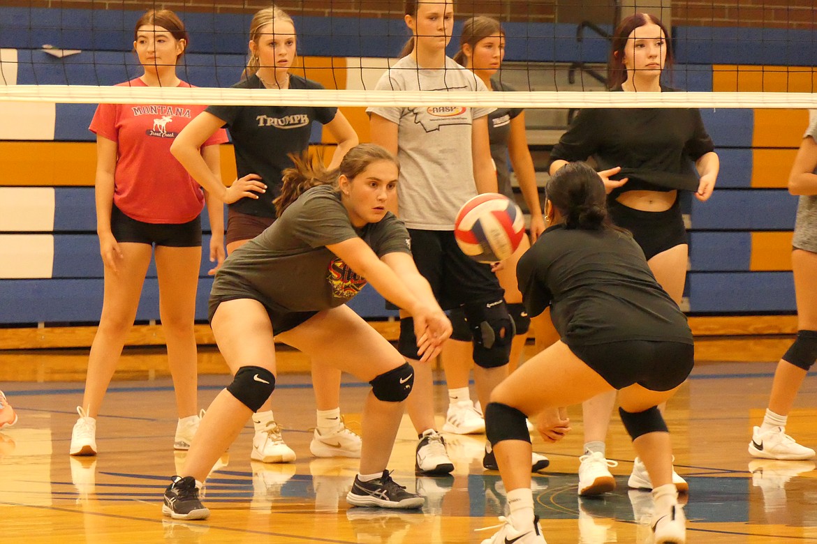 Lady Hawks players work on digging technique during practice this past week as they prepare to open the 2024 volleyball season at a tournament in Choteau. (Chuck Bandel/VP-MI)