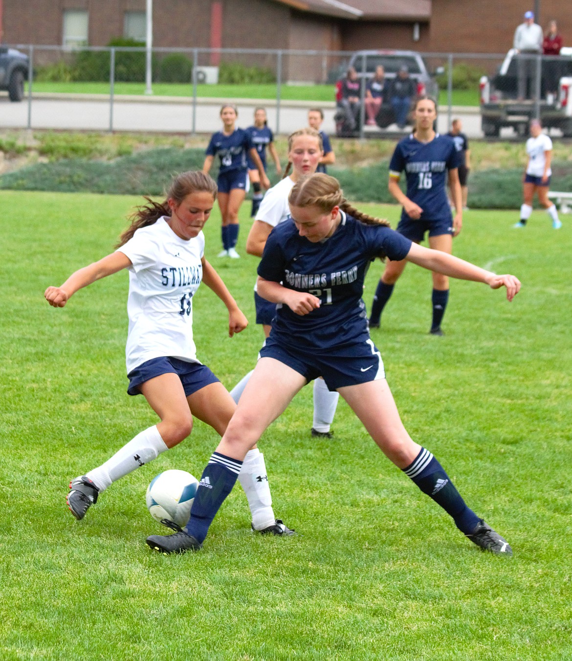 Violet Hyer fights for the ball against Stillwater Christian at the season opener on Aug. 24.