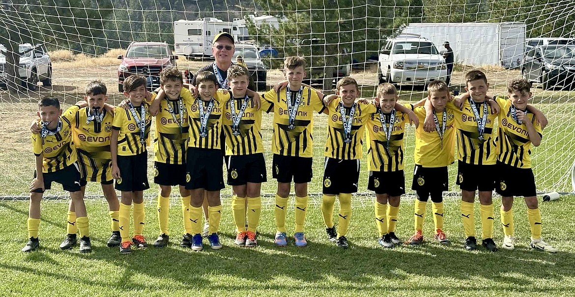 Courtesy photo
The BVB International Academy boys U11 soccer team took second place in the Silver Division at the Empire Cup at Plantes Ferry Park in Spokane Valley. In the front row from left are George Ackerly, Alex Mendoza, Griffin Curry, Collin Pinchuk, Andres Lujan, Thatcher Lechleitner, Davis Harley, Ben Erickson, Sam Mojzis, Cole Birdsell, Carter Marine and Luke Johnson; and rear, coach John O’Neil