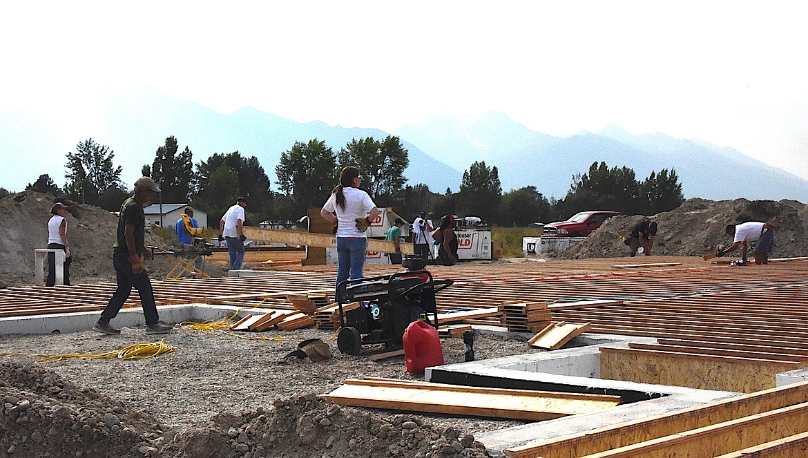 Volunteers work on Jake's House in Ronan during the building blitz held Aug. 9-11. (Berl Tiskus/Lake County Leader)