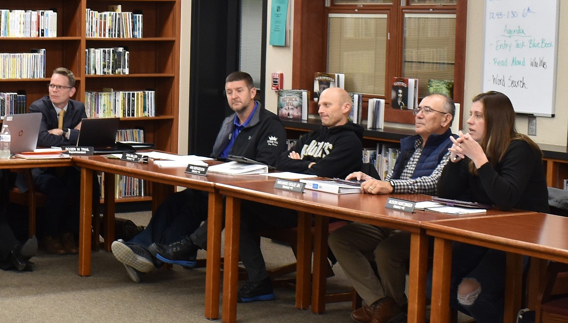 From left, Royal School District superintendent Roger Trail and board members Dan Miller, Ian Bergeson, Nasario Soliz Jr and Alison Huntzinger listen to a presentation. Trail said Royal district officials are projecting a decline in enrollment for 2024-25 and expect declines to continue, forcing some changes in district operation.