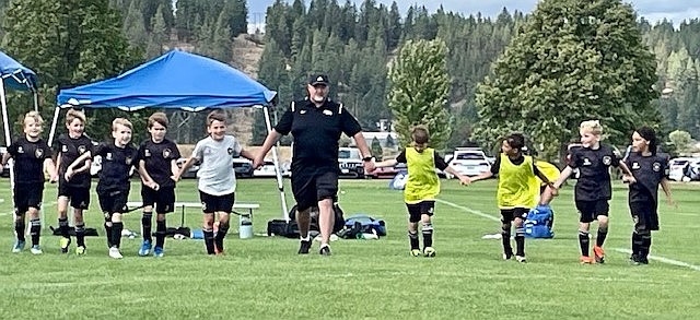 Photo by ALYSSA McLEMORE
The Sting 2016 boys Black soccer team, with head coach Ian McKenna, played in the Empire Cup last weekend at Plante's Ferry Soccer Complex in Spokane Valley. On Friday, Aug. 23, the Sting lost 8-1 to the Washington East Surf Soccer Club. The Sting Black goal was scored by Eli Hocking. Saturday afternoon, the Sting beat BVBIA CDA 6-1. Sting Black goals were scored by Peter Ward, Eli Hocking and Oliver Lundy). On Sunday afternoon, the Sting fell 3-1 to the Kittitas Valley Junior Soccer Association, despite several excellent saves by Sting goalie Leo Leferink. The Sting Black goal was scored by Jackson Martin.