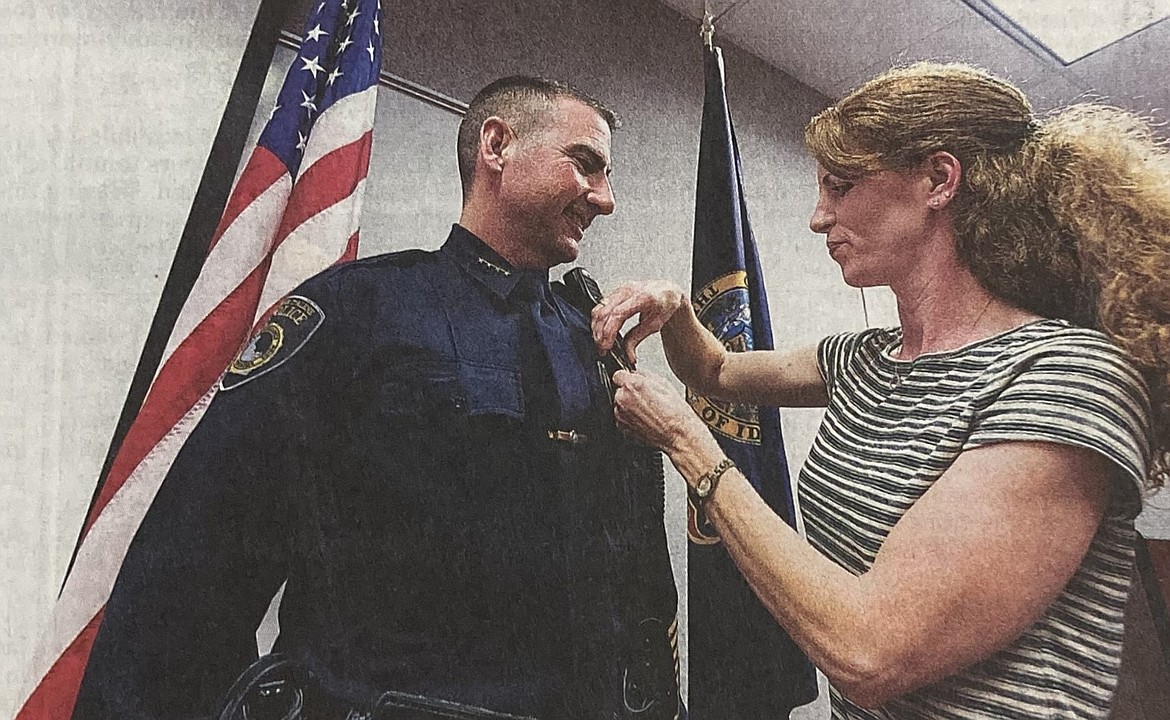 In September 2014, Kristi White penned a badge on her husband, Lee, the new Coeur d’Alene police chief.