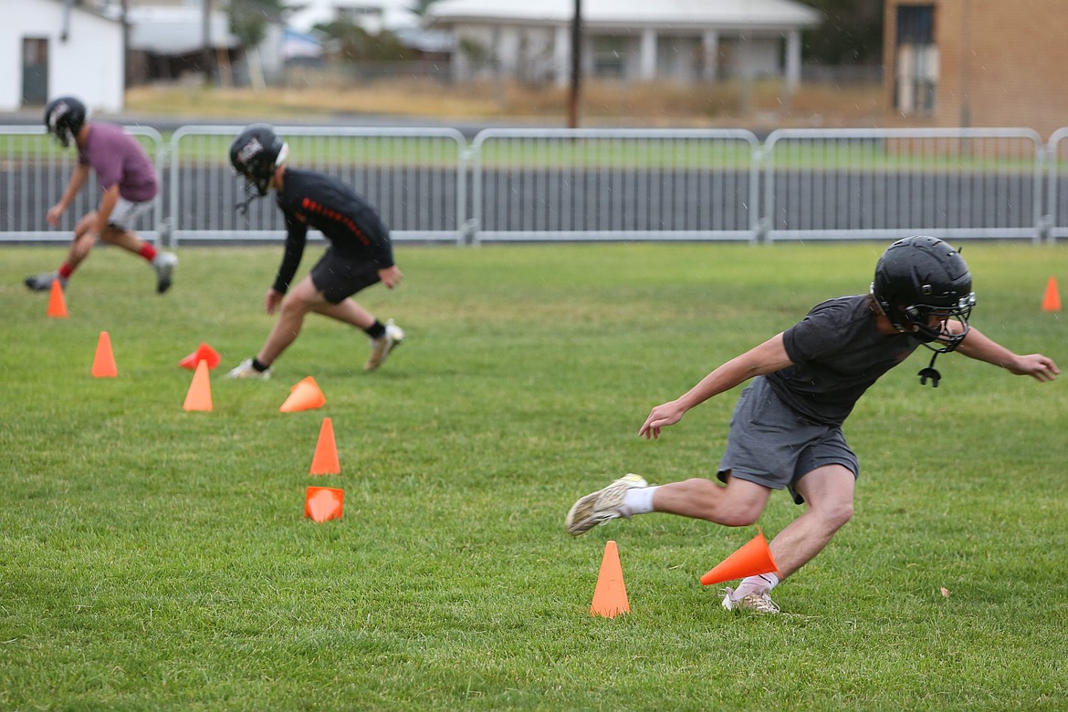 Almira/Coulee-Hartline players race against one another during an agility drill.