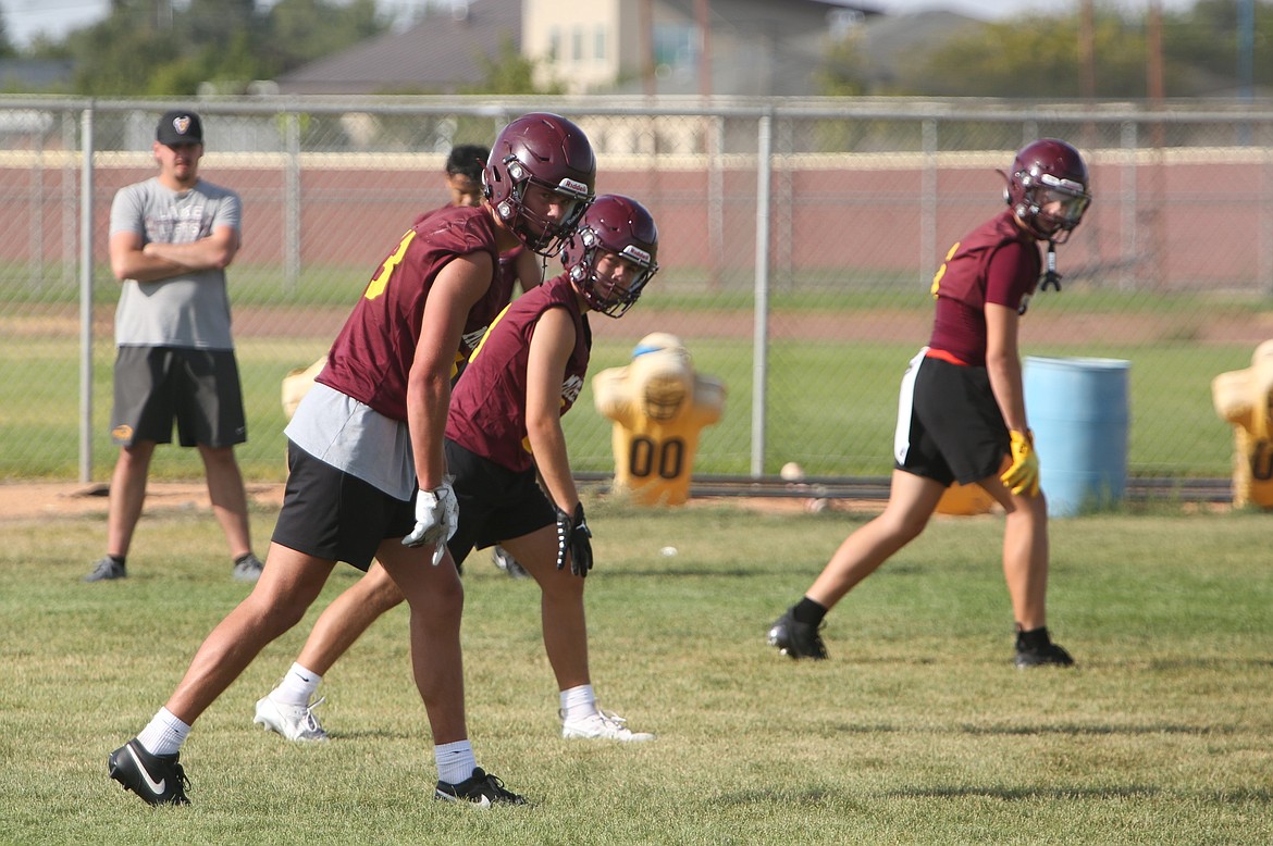 Moses Lake receivers look for the ball to be snapped during practice on August 21. The Mavericks saw their three leading receivers from 2023 graduate last spring.