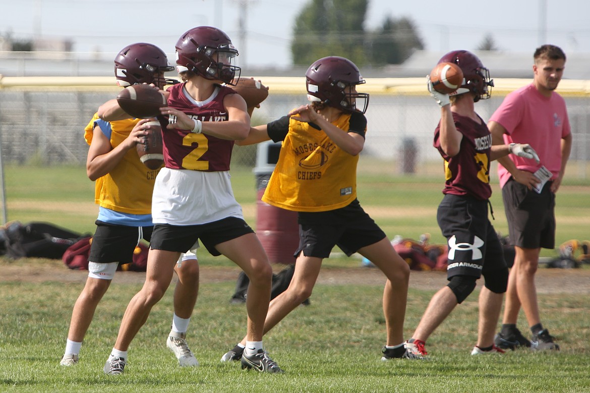 Quarterbacks drop back to throw the ball during practice on August 21. Moses Lake junior Brady Jay (2) returns this fall after throwing for 3,251 yards, 48 touchdowns and 16 interceptions in 2023.