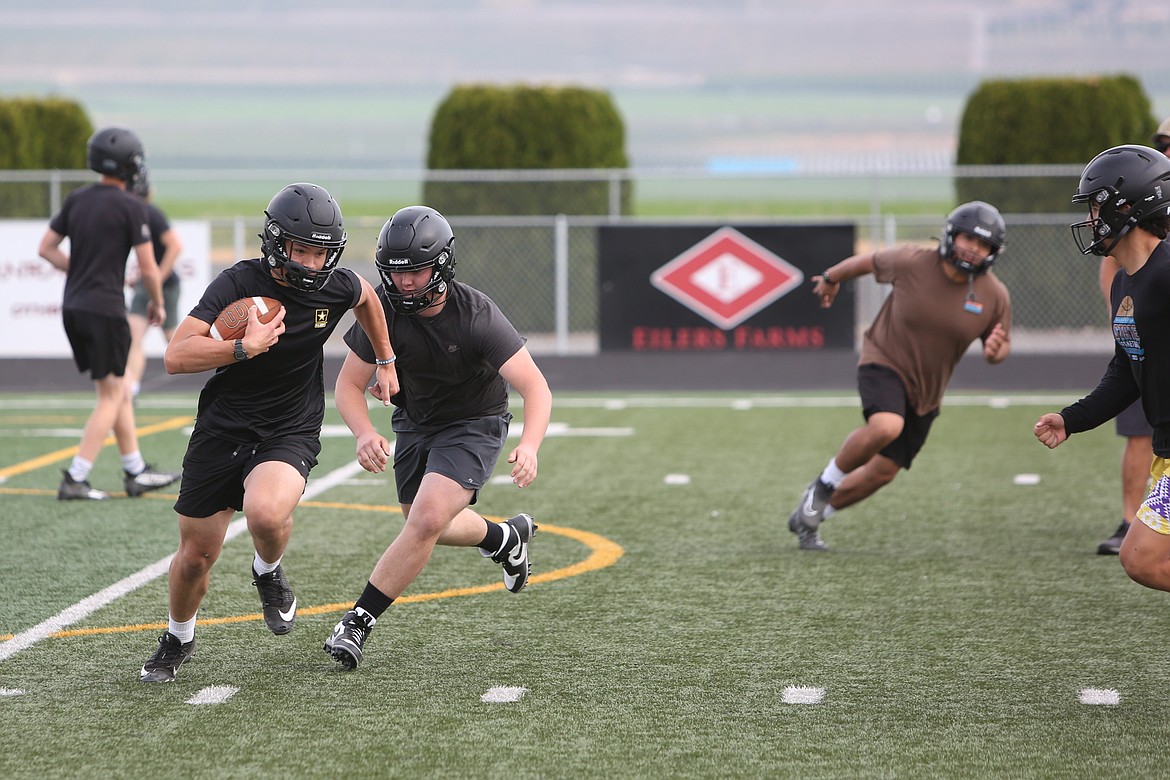 Royal defenders participate in a pursuit drill during practice on August 23.