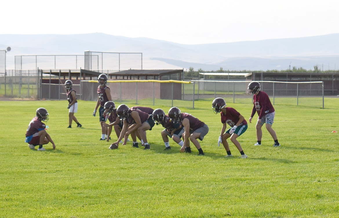 The Wahluke Warriors practice some offensive plays Aug. 22. Offense is where the Warriors need the most work on the field, coach and players agreed.