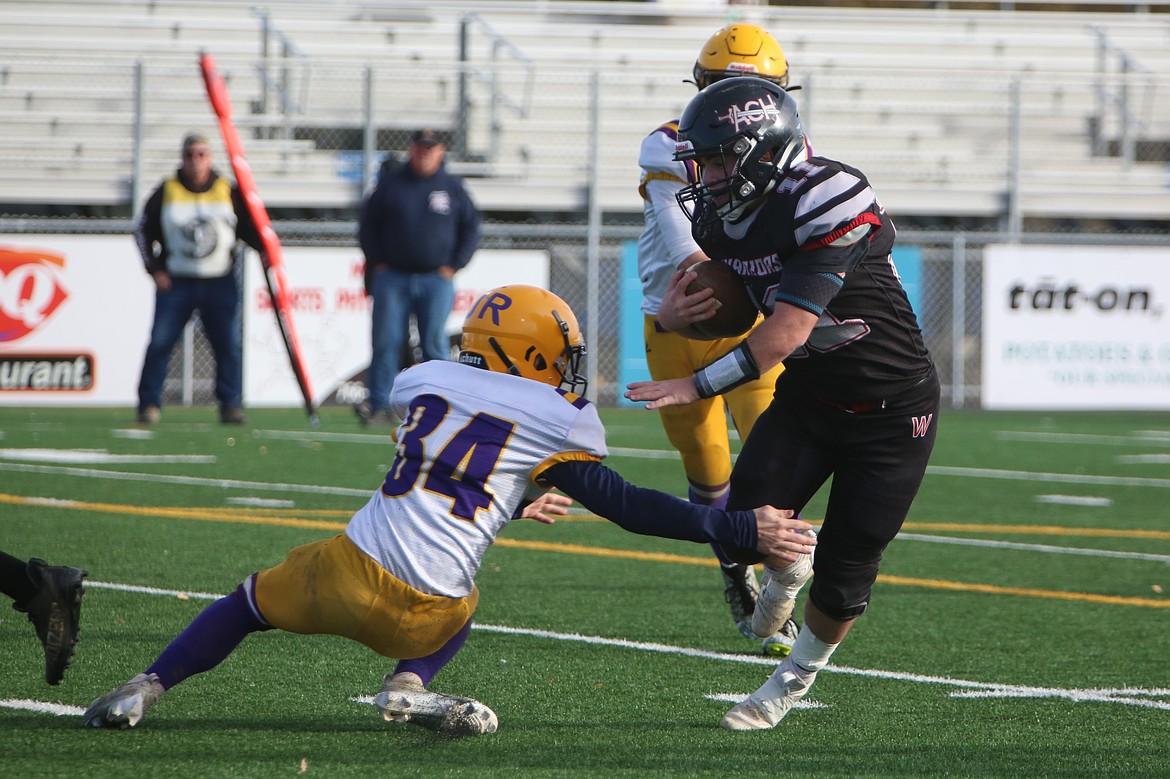 Almira/Coulee-Hartline’s Carter Pitts shakes off a Concrete defender on Nov. 18, 2023. Pitts had 146 total yards in the match versus Mossyrock.