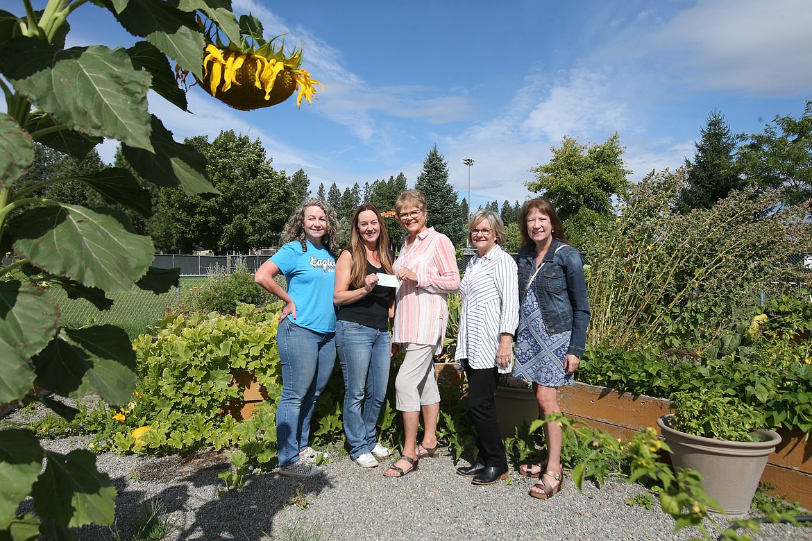 The Coeur d'Alene Garden Club gifted $500 to the Skyway Elementary School garden program Wednesday morning. The club is also providing monetary support to garden programs at Ramsey Magnet School of Science and Lake City High School. From left: Carol Behrens and Megan Beaudry, Skyway; Cheryl Christensen, Rhoda King and Susan Davenport, Coeur d'Alene Garden Club.