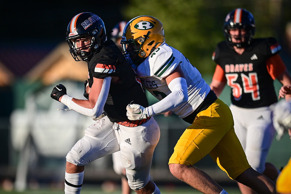 Flathead wide receiver Eli Coopman (6) looks upfield after a reception in the second quarter against Great Falls CMR at Legends Stadium on Friday, Aug. 30. (Casey Kreider/Daily Inter Lake)