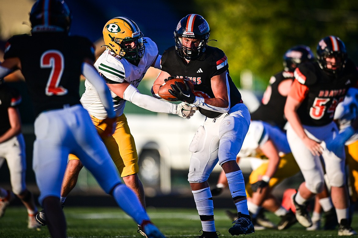 Flathead wide receiver Eli Coopman (6) looks upfield after a reception in the second quarter against Great Falls CMR at Legends Stadium on Friday, Aug. 30. (Casey Kreider/Daily Inter Lake)