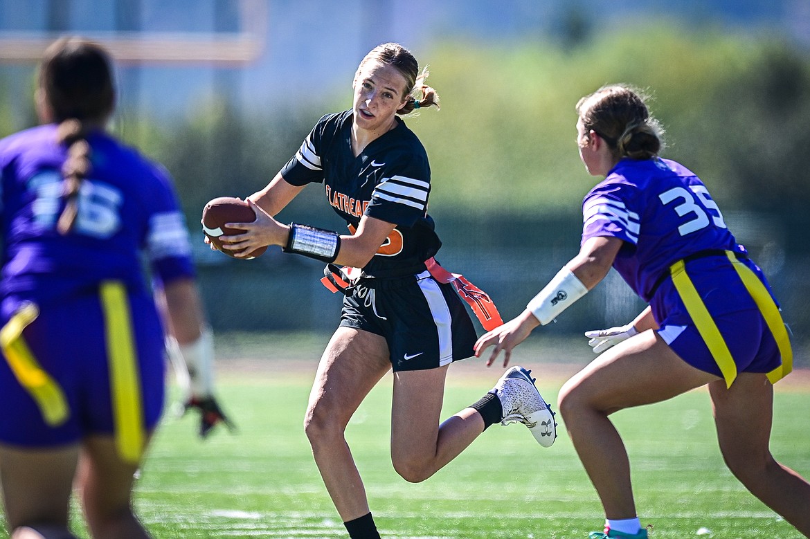 Flathead quarterback Julia Kay (23) picks up yardage on a run in the first half against Butte at the Kalispell Jamboree at Legends Stadium on Saturday, Aug. 31. (Casey Kreider/Daily Inter Lake)