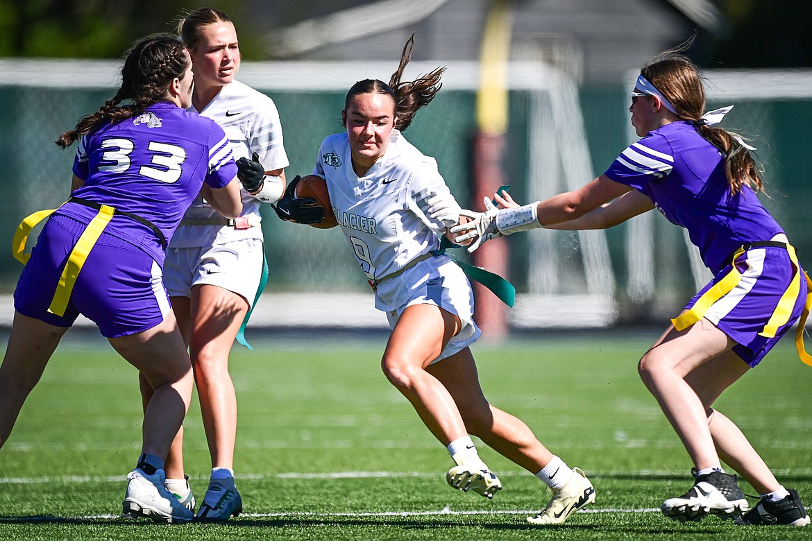 Glacier's Khirsten Terrell (9) looks for running room in the second half against Butte at the Kalispell Jamboree at Legends Stadium on Saturday, Aug. 31. (Casey Kreider/Daily Inter Lake)