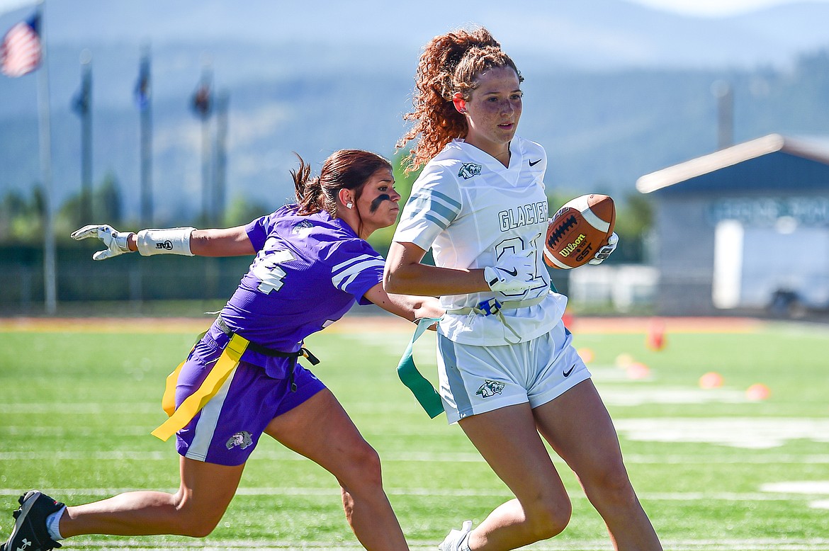 Glacier's Cadence Daniels (32) picks up yardage after a catch against Butte at the Kalispell Jamboree at Legends Stadium on Saturday, Aug. 31. (Casey Kreider/Daily Inter Lake)