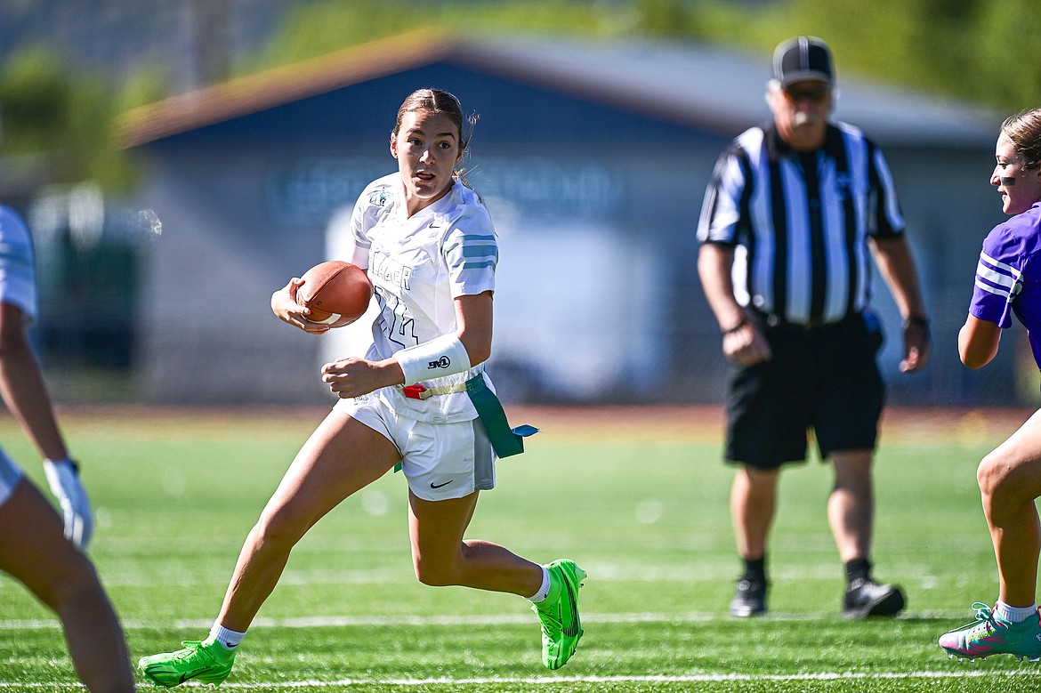 Glacier quarterback Karley Allen (14) runs for a touchdown in the first half against Butte at the Kalispell Jamboree at Legends Stadium on Saturday, Aug. 31. (Casey Kreider/Daily Inter Lake)