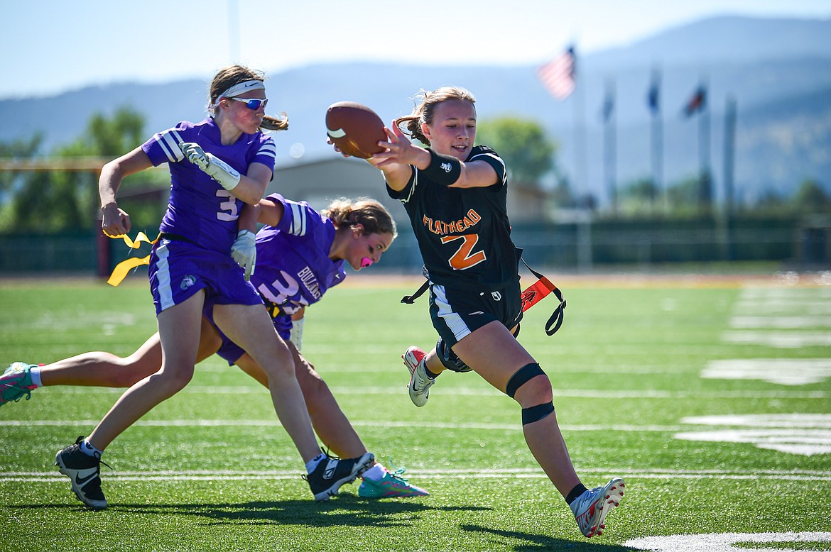 Flathead's Kenlie Roth (2) extends the ball across the goaline for a touchdown in the first half against Butte at the Kalispell Jamboree at Legends Stadium on Saturday, Aug. 31. (Casey Kreider/Daily Inter Lake)