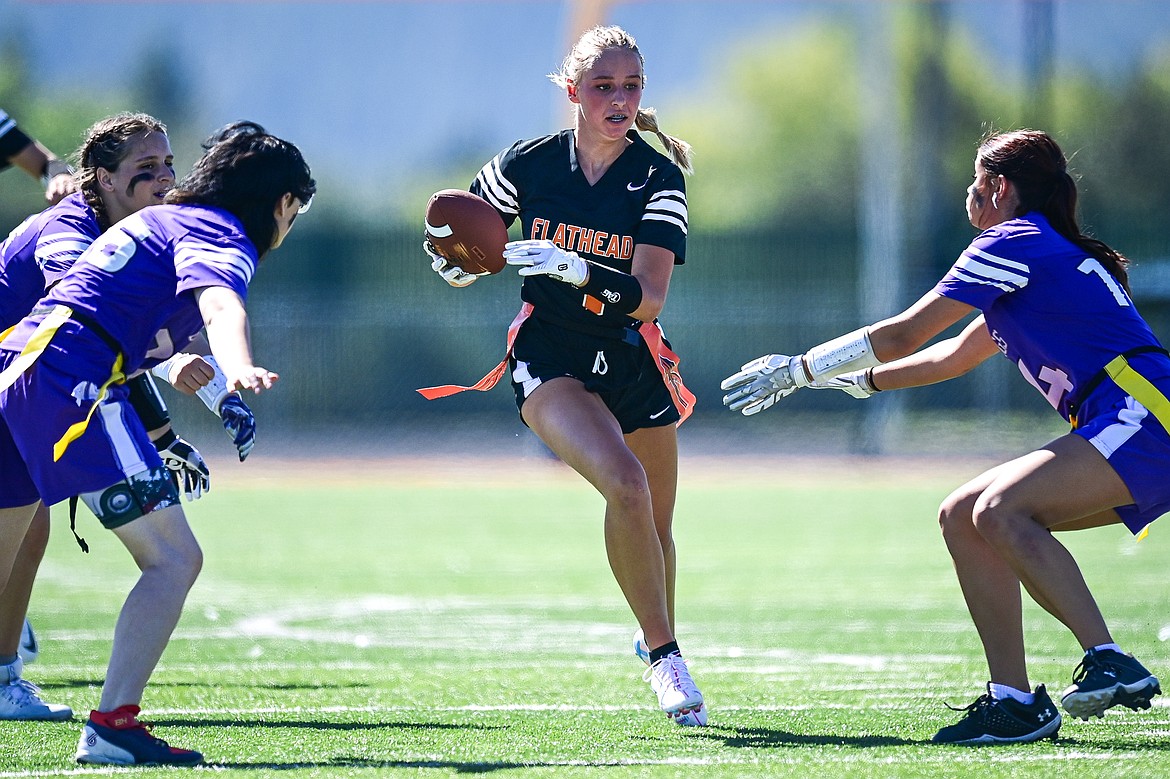 Flathead's Avory Galey (7) picks up yardage after a reception in the first half against Butte at the Kalispell Jamboree at Legends Stadium on Saturday, Aug. 31. (Casey Kreider/Daily Inter Lake)