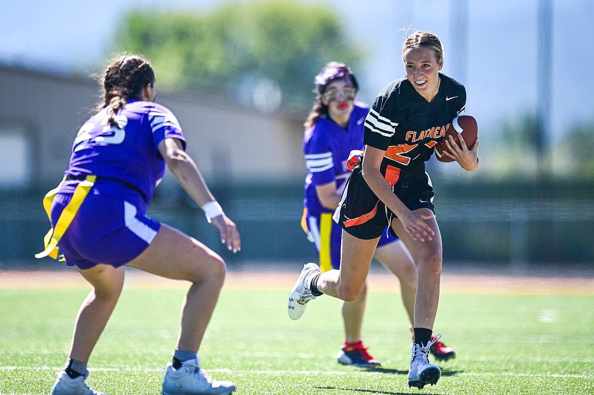 Flathead quarterback Julia Kay (23) picks up yardage on a run in the second half against Butte at the Kalispell Jamboree at Legends Stadium on Saturday, Aug. 31. (Casey Kreider/Daily Inter Lake)