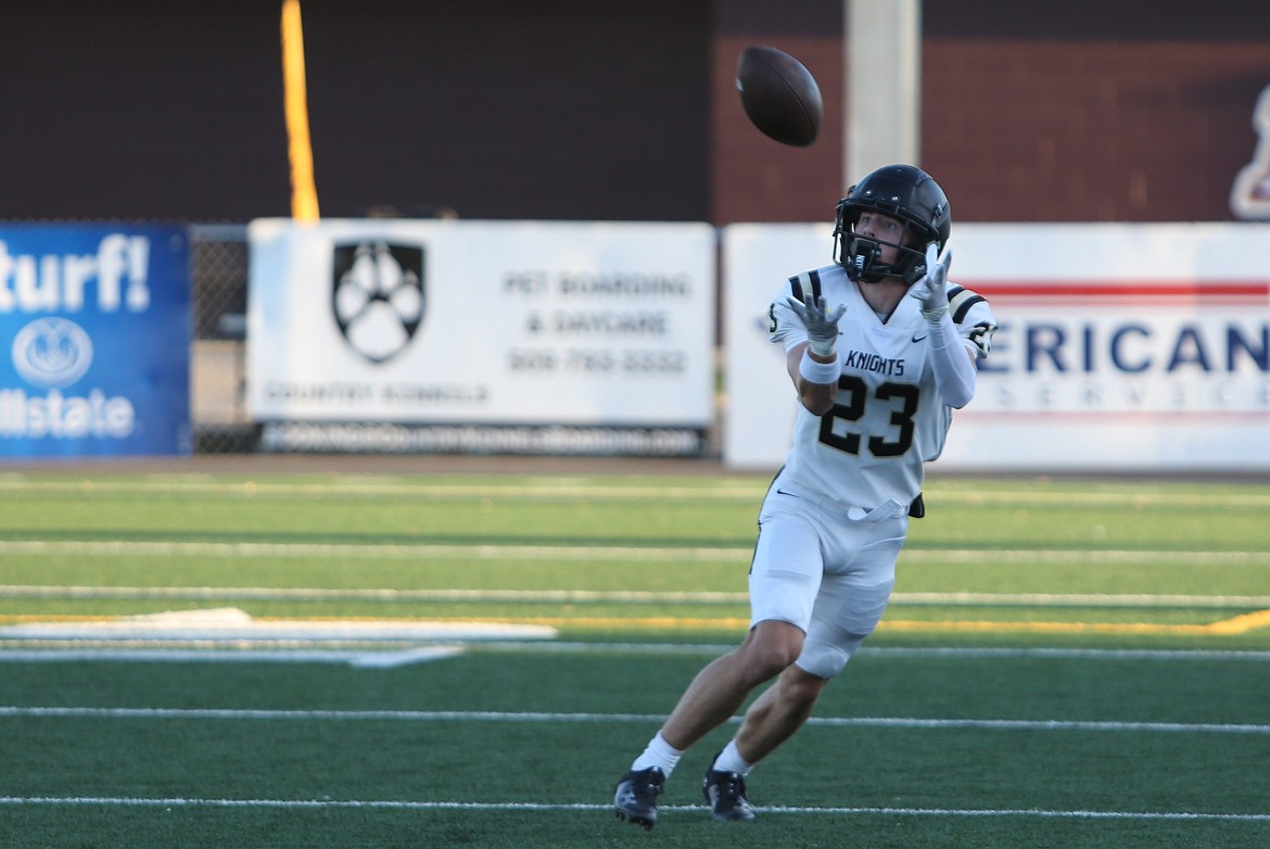 Royal junior Shea Stevenson hauls in a pass during a session of plays against the Ephrata defense on Friday.