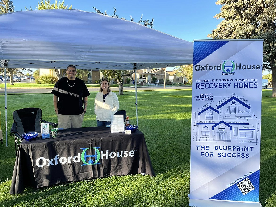 Grant County Health District sitaff organized an event in collaboration with the Saturday farmers market in McCosh Park to educate area residents about addiction and resources to help people get clean. One of the booths there represented the newly-opened Women's Oxford House. Pictured are Nokey Pando and Kelley Rimbey who help operate the program.