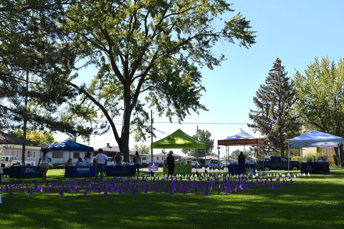 Flags decorated McCosh park in Moses Lake for National Overdose Day. The 254 purple flags represented locals saved from overdose and the 108 whote flags represented those lost to an overdose from 2018 to 2022.