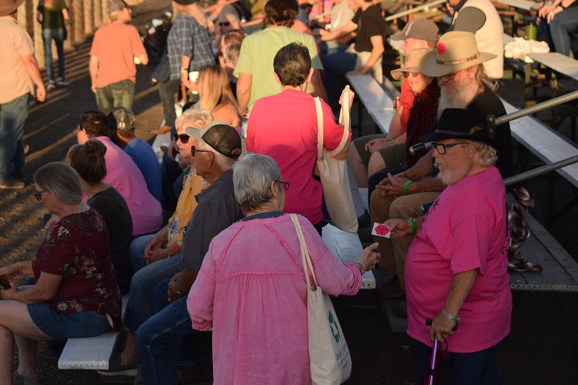 Members of the audience dressed in pink for the Ritzville Rodeo on Aug. 30. The theme of Friday night's performance was “tough enough to wear pink” in support of Breast Cancer Awareness.