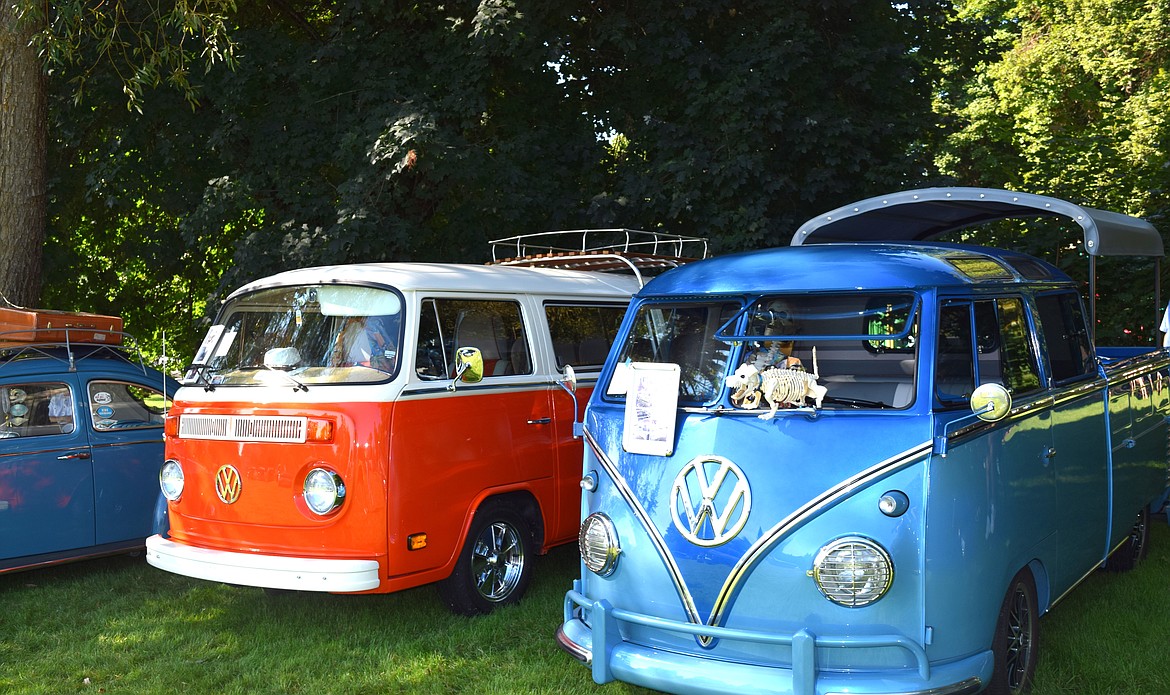 Susan Baptista's "rescue" cars: The vibrant tangerine VW Bus was "the color of a root beer float" when she and her husband first got ahold of it.