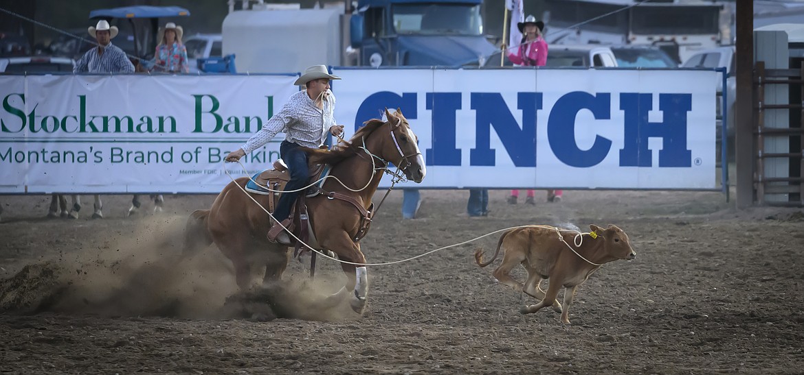 Kyle Bagnell from Polsob in the tie-down roping competition at the Sanders County Fair. (Tracy Scott/Valley Press)