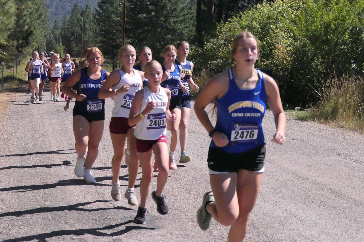 Lady Hawks sophomore Aubrey Baxter leads a group of runners in the initial stage of the Ronan Canal Bank run this past Friday outside of Ronan.  (Chuck Bandel/VP-MI)