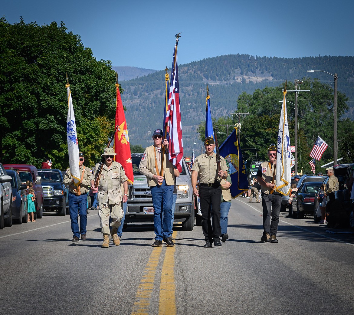 Plains VFW Auxiliary Post 3596 Color Guard leads the Sanders County Fair parade. (Tracy Scott/Valley Press)