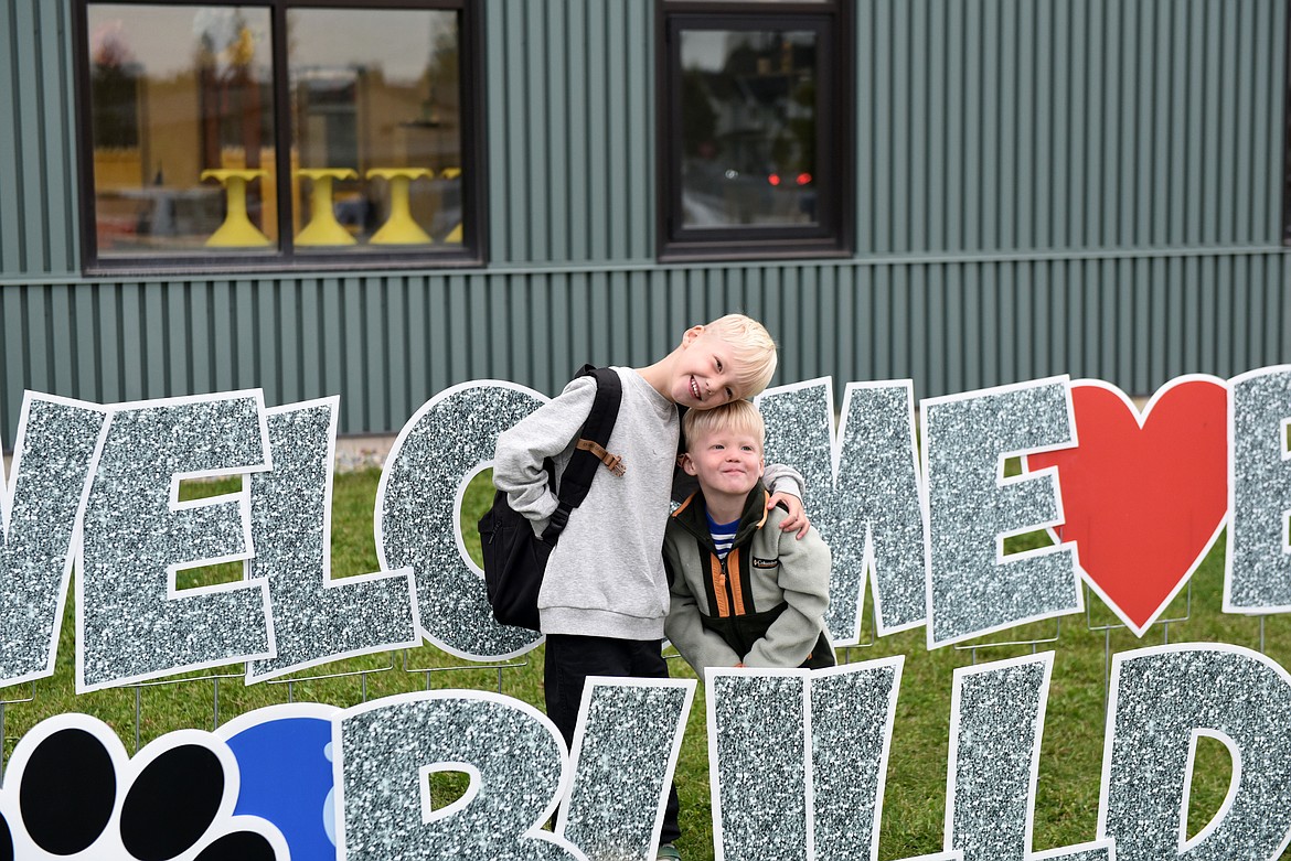 Pre-k isn't too young to help send your older brother off on the first day of school. (Kelsey Evans/Whitefish Pilot)