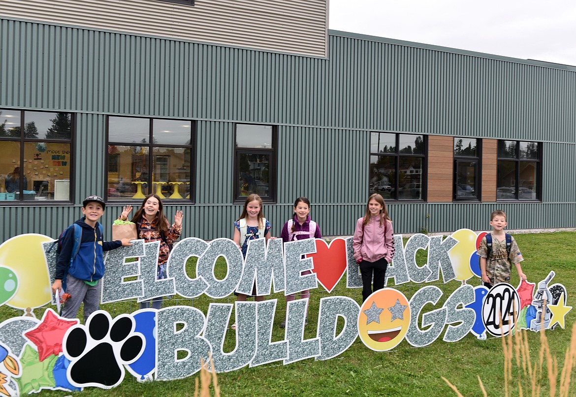 Friends in second and fourth grade are excited for the first day of school at Muldown Elementary. (Kelsey Evans/Whitefish Pilot)