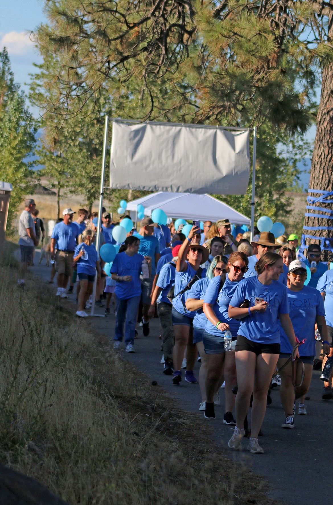 Walkers take off from Dog Beach as they take part in the Walk for HOPE on Sunday.