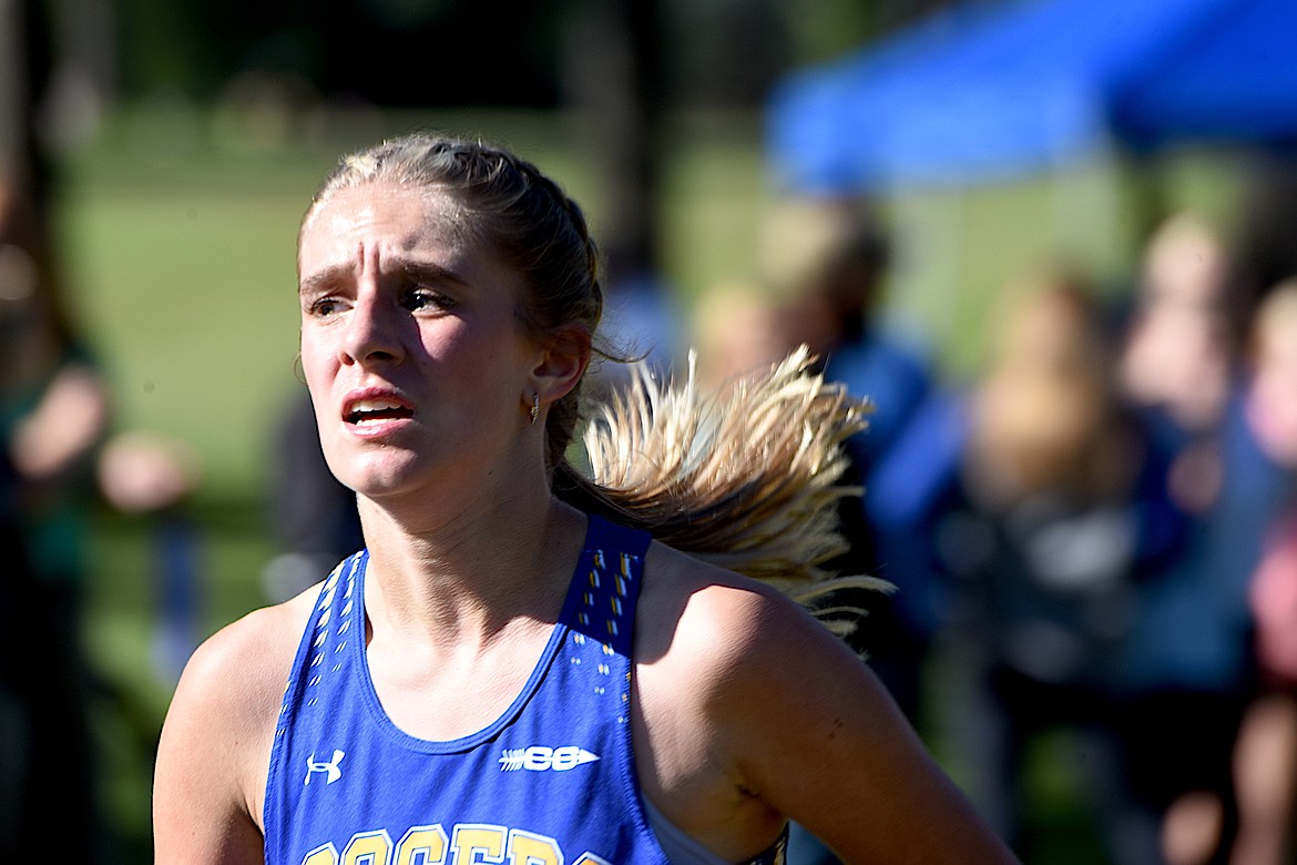 Libby freshman Capri Farmer runs at the Libby Invitational cross country meet Friday, Aug. 30, 2024. Farmer finished 19th. (Scott Shindledecker/The Western News)