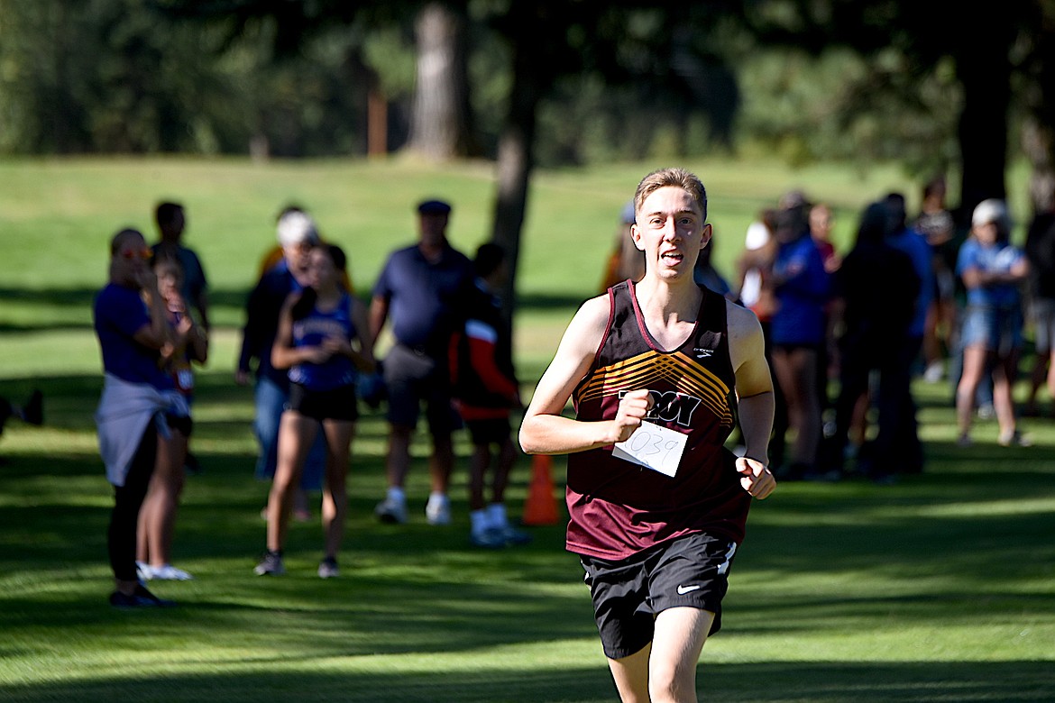 Troy junior Dmitrii Walenter runs at the Libby Invitational cross country meet Friday, Aug. 30, 2024. Walenter finished 86th. (Scott Shindledecker/The Western News)