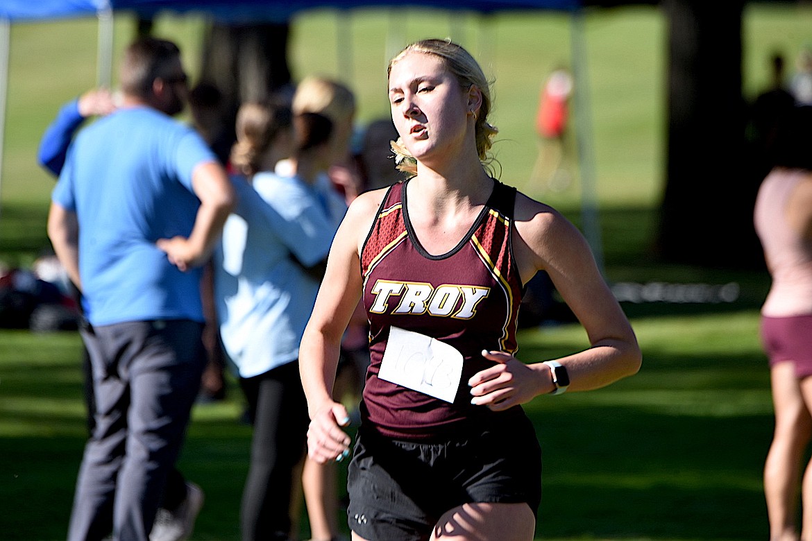 Troy junior Jaylee Meyers runs at the Libby Invitational cross country meet Friday, Aug. 30, 2024. Meyers finished 59th. (Scott Shindledecker/The Western News)